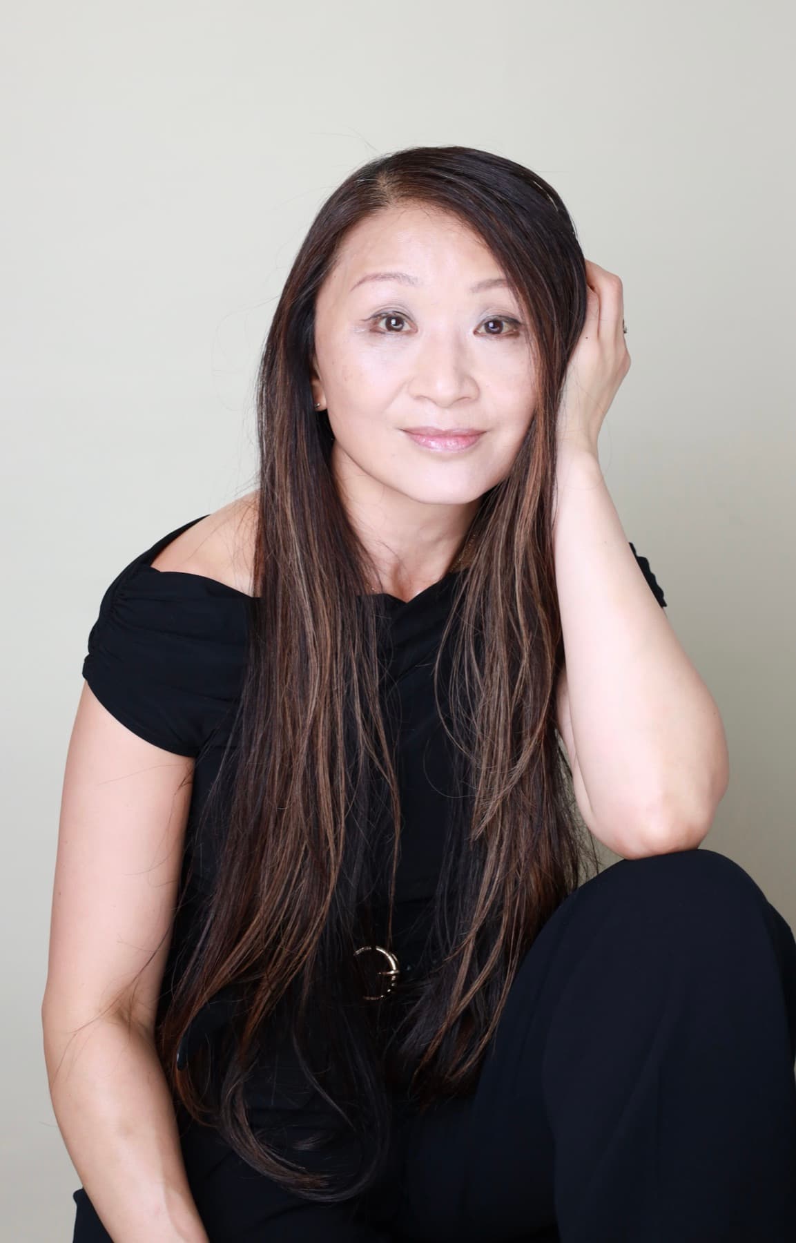 Winnie V. Cheung, seated portrait